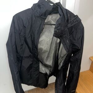 The North Face women’s black rain jacket.